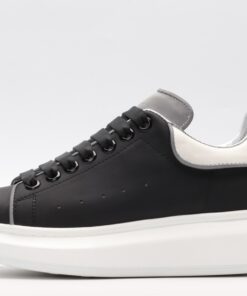 ALEXANDER MCQUEEN black oversized sneakers with silver heel