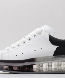 ALEXANDER MCQUEEN white oversized sneakers with black heel