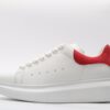 ALEXANDER MCQUEEN OVERSIZED SNEAKER with red heel