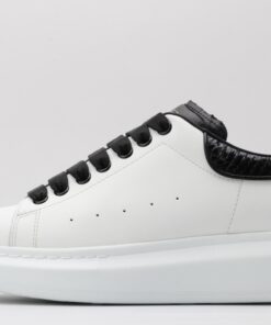 ALEXANDER MCQUEEN OVERSIZED SNEAKER with blue stamped python heel