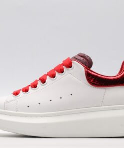 ALEXANDER MCQUEEN oversized sneakers with red heel